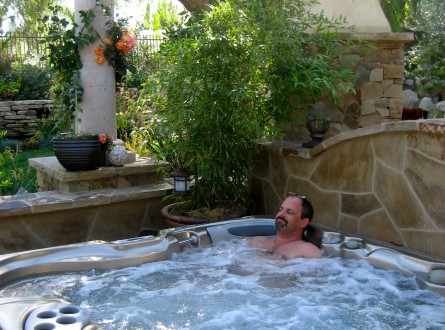 Shirley Bovshow's Spa Retreat Garden Makeover with husband enjoying his daily spa
