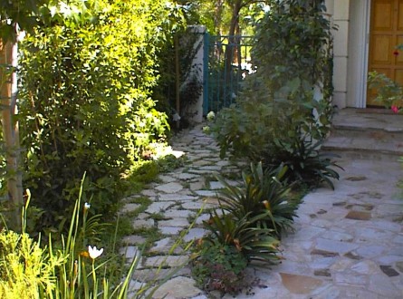 flagstone walkway entry to home