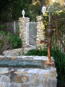 antique water pump fountain
